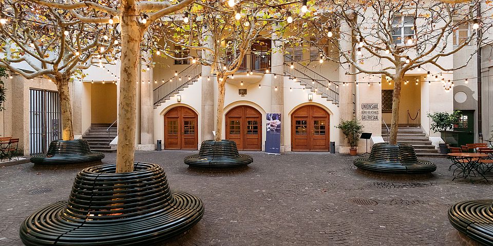 Beige building with patio